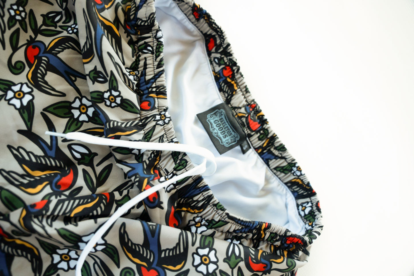 Blue Bird Swim Trunks